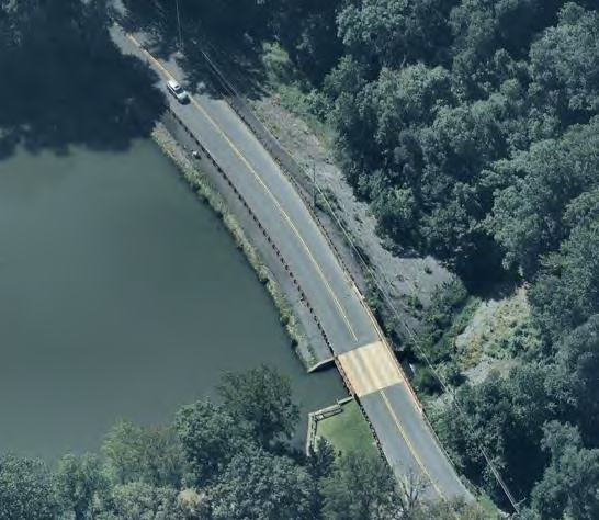 Aerial image of road on a dam.